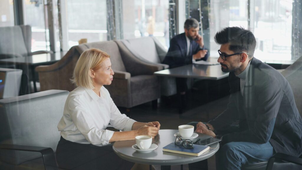 Man and Woman Meeting for Coffee
