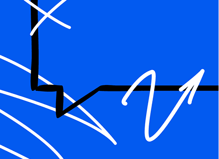 Woman walking on a wet street at night