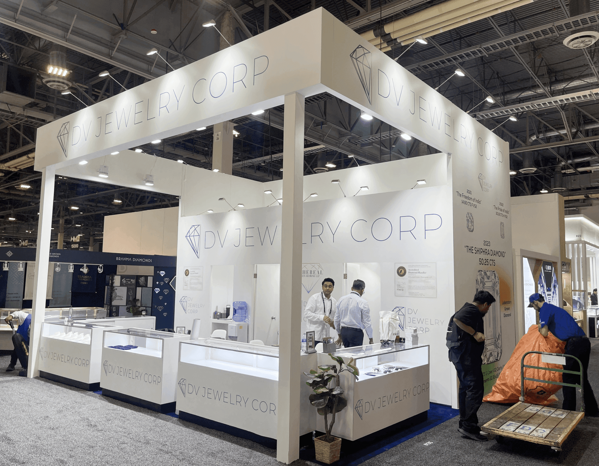 10x20 gem and jewelry booth at World Market Center Las Vegas prepared with display cases and buyer meeting area