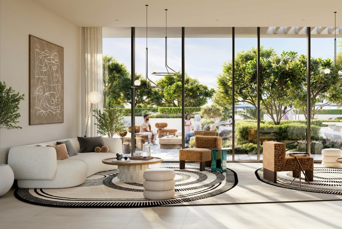 Modern lobby of a new apartment building featuring sleek furniture and surf-themed decor.