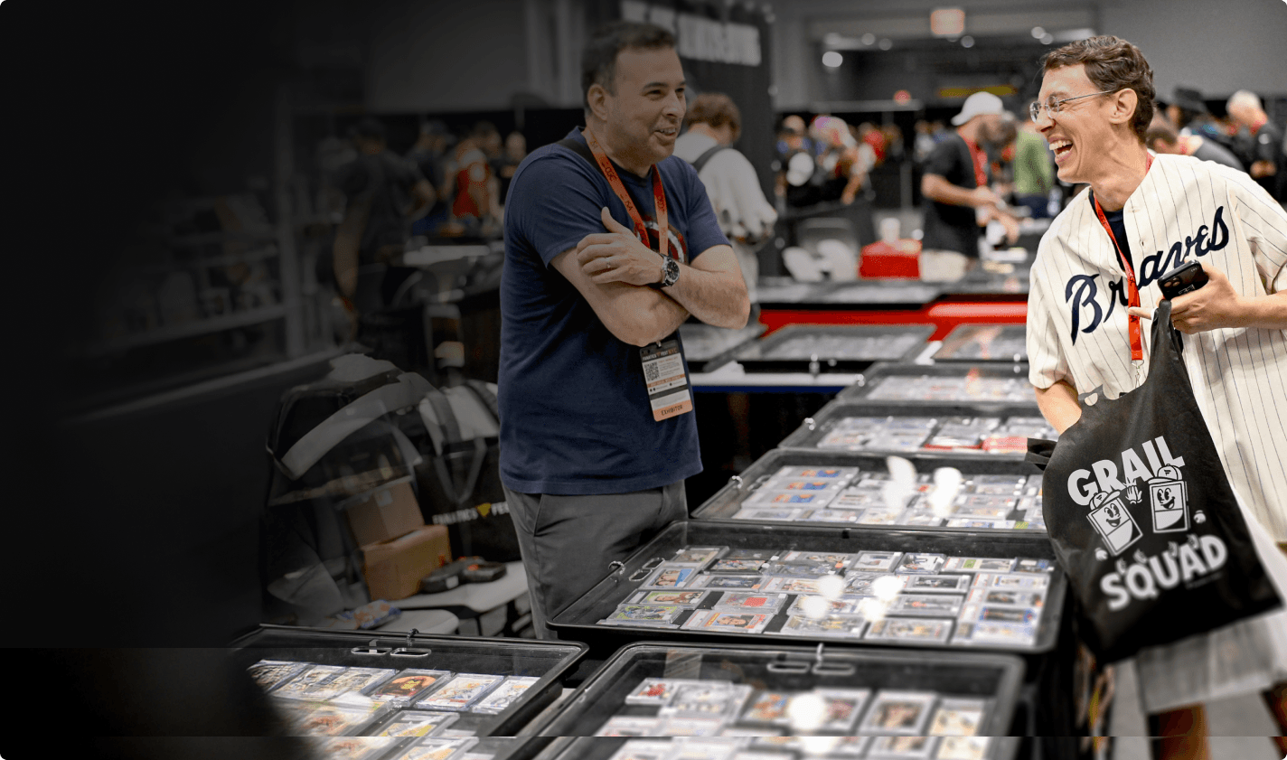 Sports card dealers networking at Fanatics Collect trading card event with inventory displays