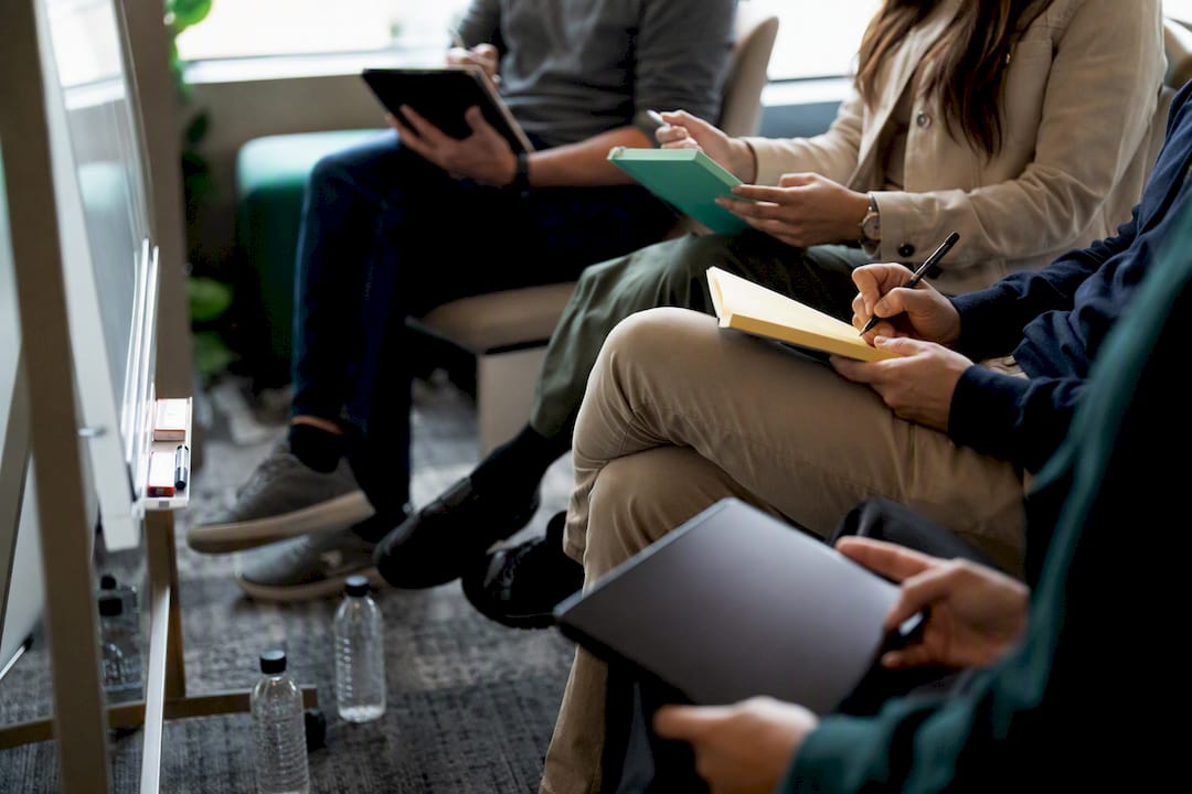 Feet and hands of cohort onboarding group
