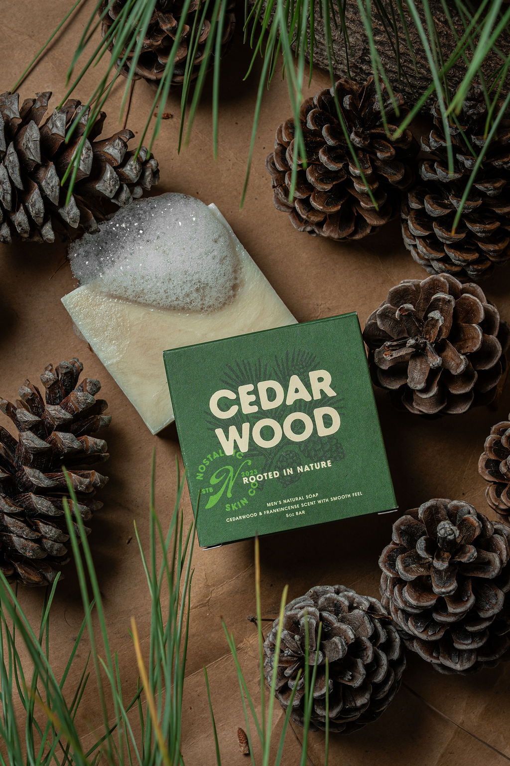 Cedar Wood soap packaging styled with pine cones