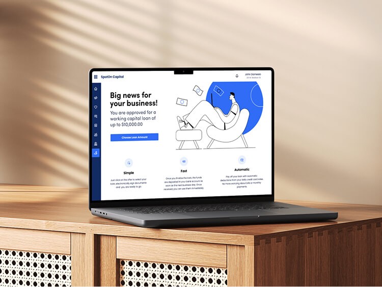 “Laptop displaying a financial dashboard interface focused on clarity, approval status, and business insights for merchants.”