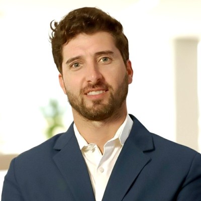 a man wearing glasses and a black shirt