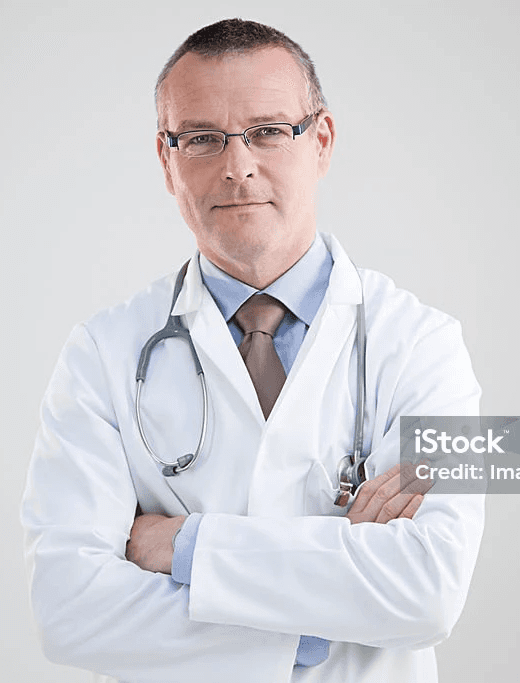 a man in a lab coat standing with his hands on his hips