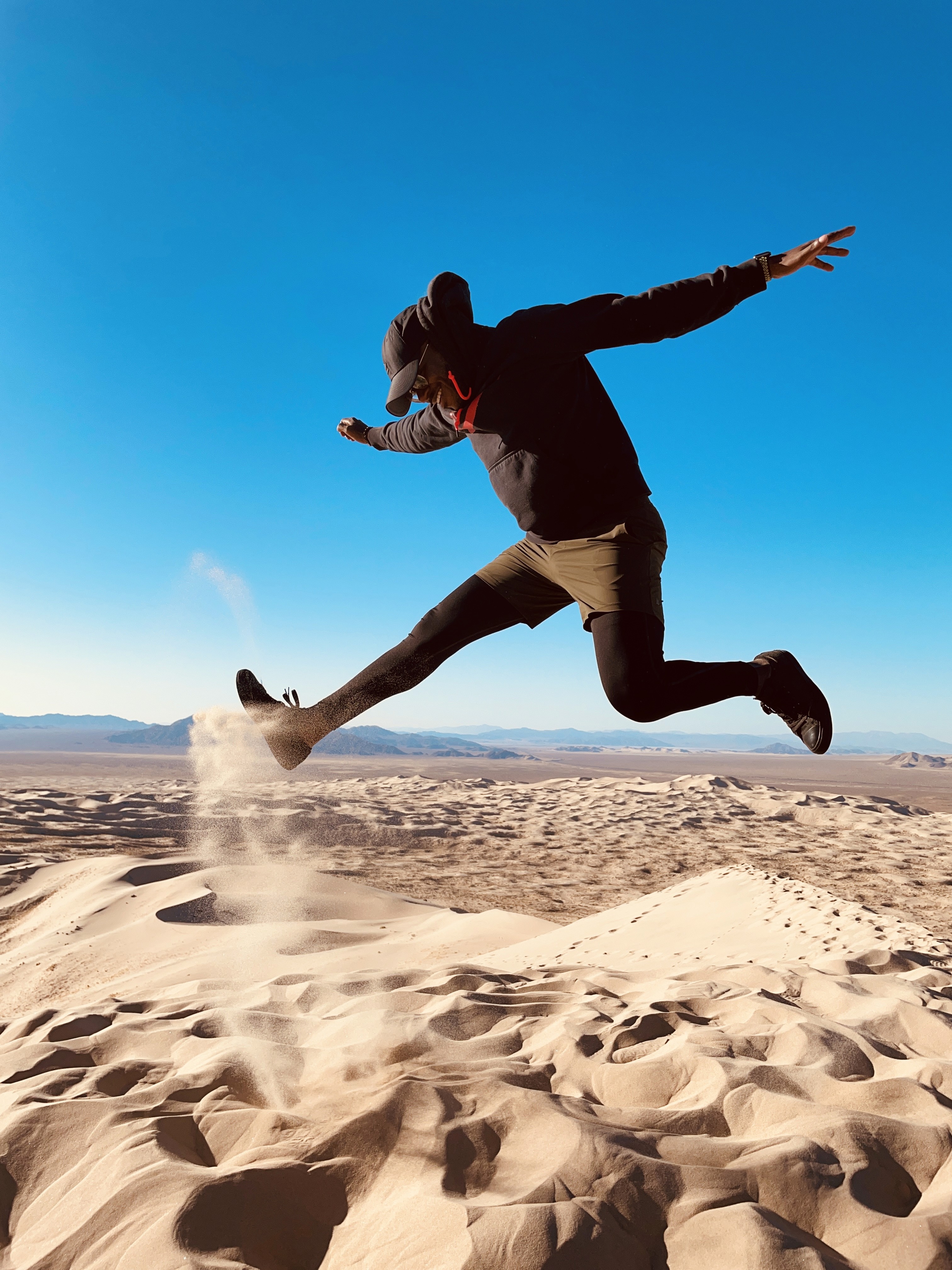A photo of Aman in the Mojave desert.