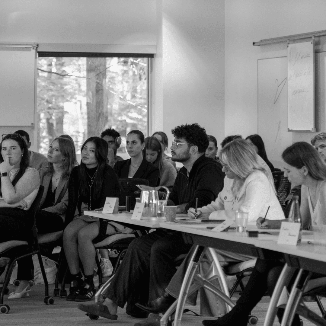 Speaker Presenting at Conference with Audience