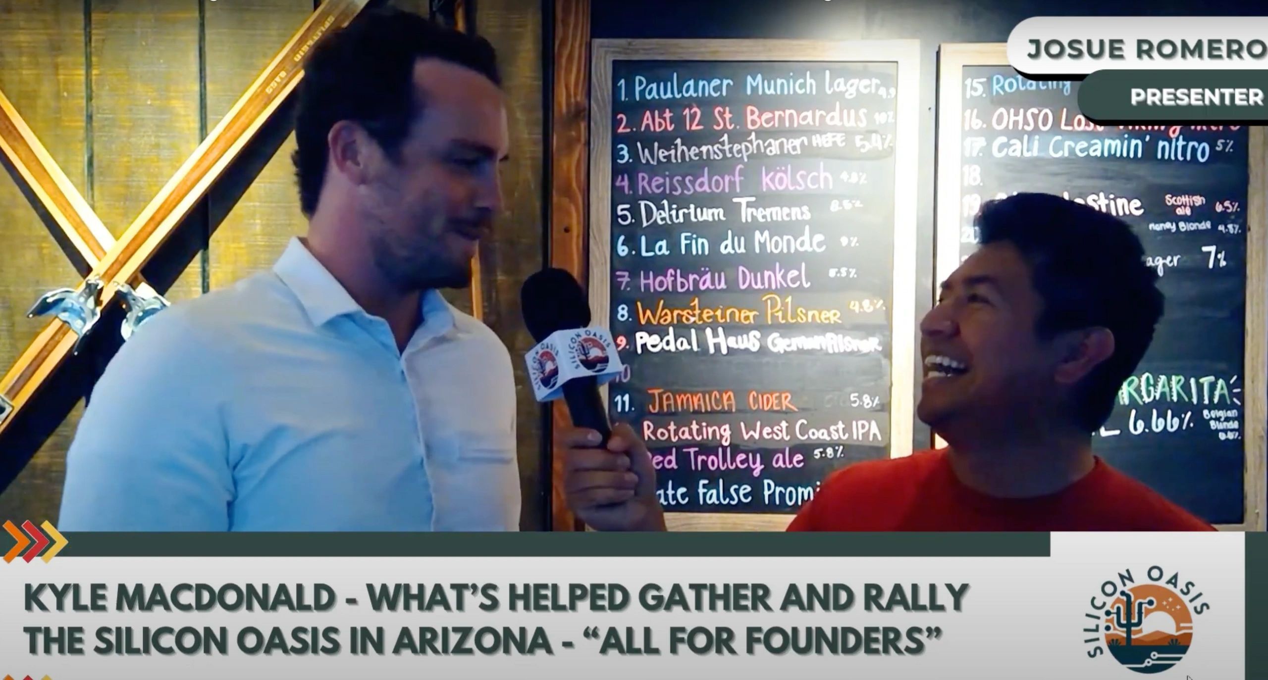 a black and white living room with a large tv