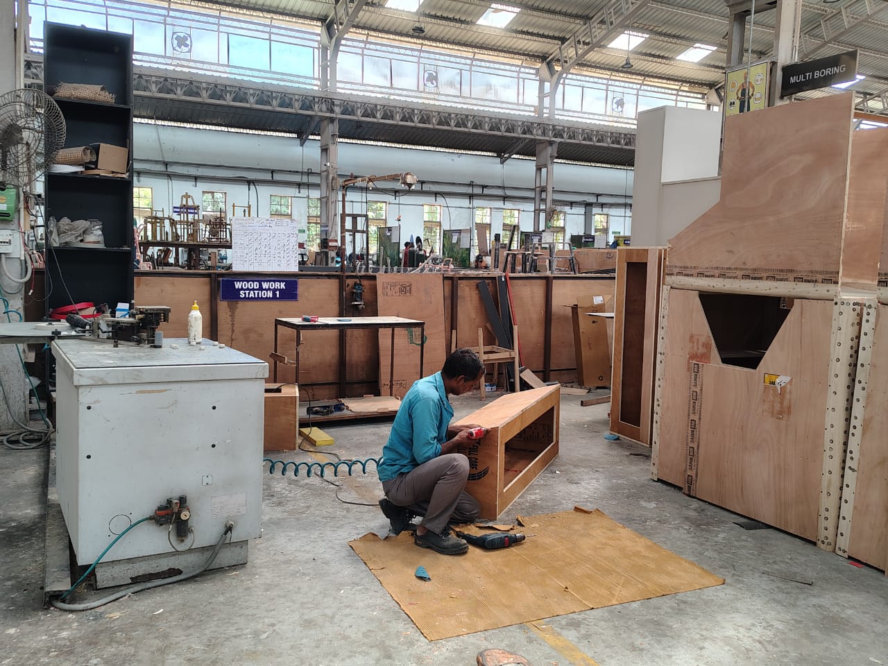 A woman using a sewing machine to sew clothes
