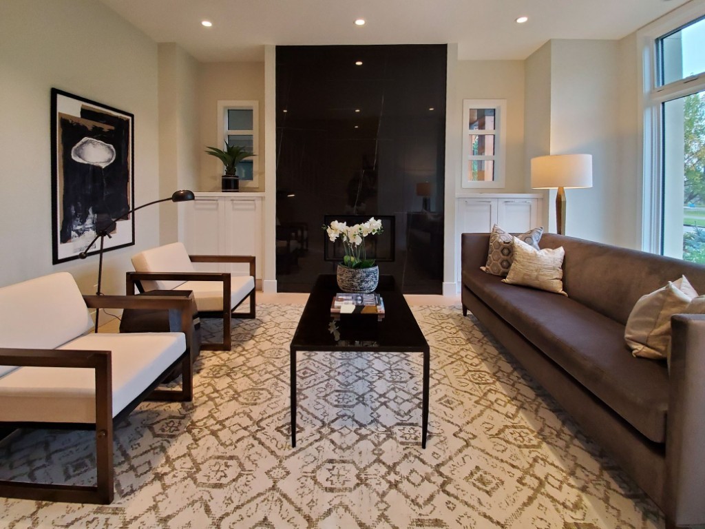 Image of Luxury home design featuring a cozy living room with furniture and layout design by KHD Homes.