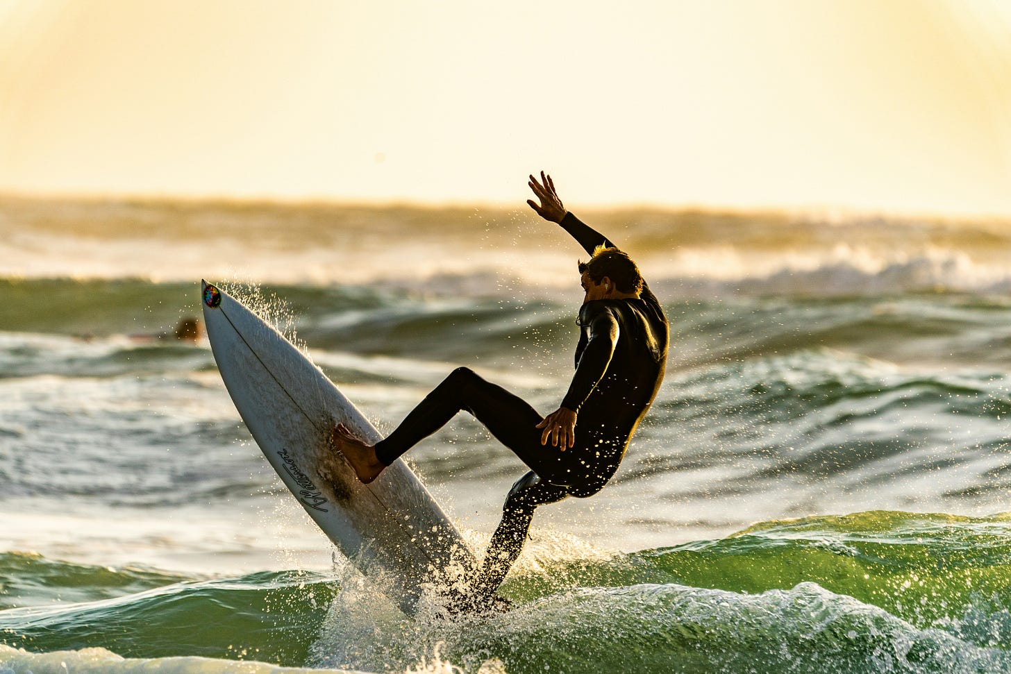surfer playing in the waves