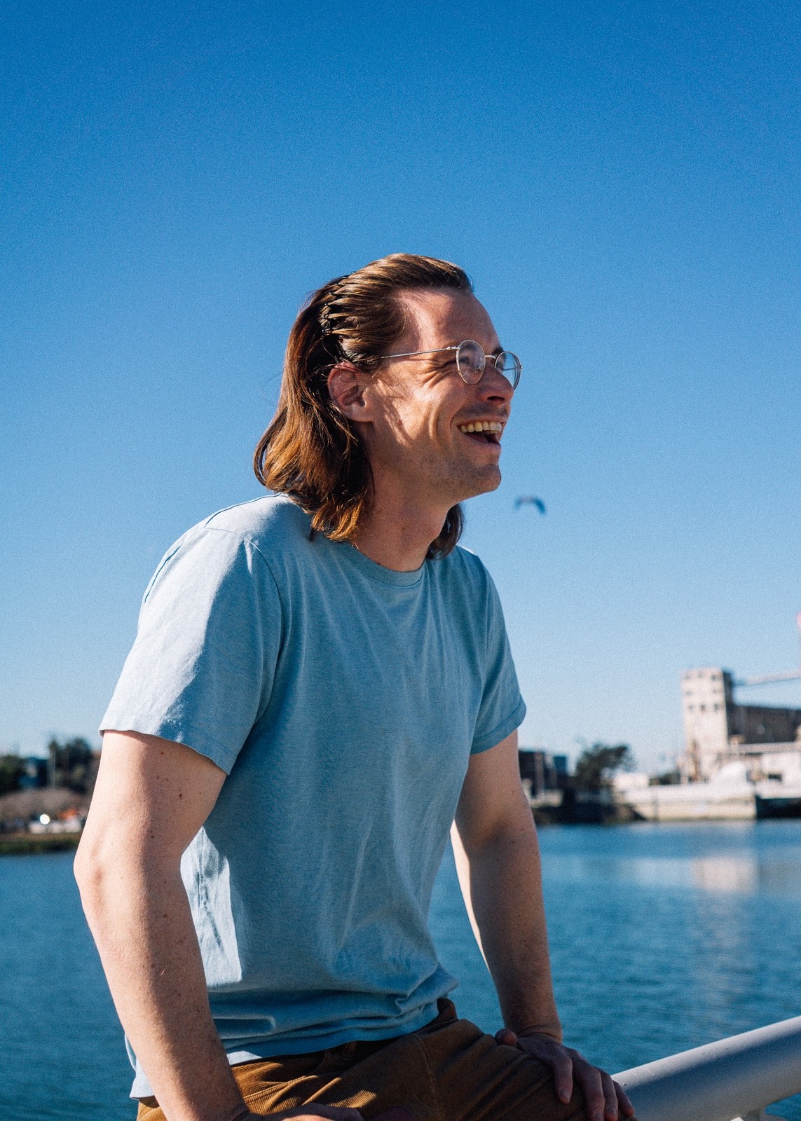 Outdoor portrait of Moritz, CEO, by the water