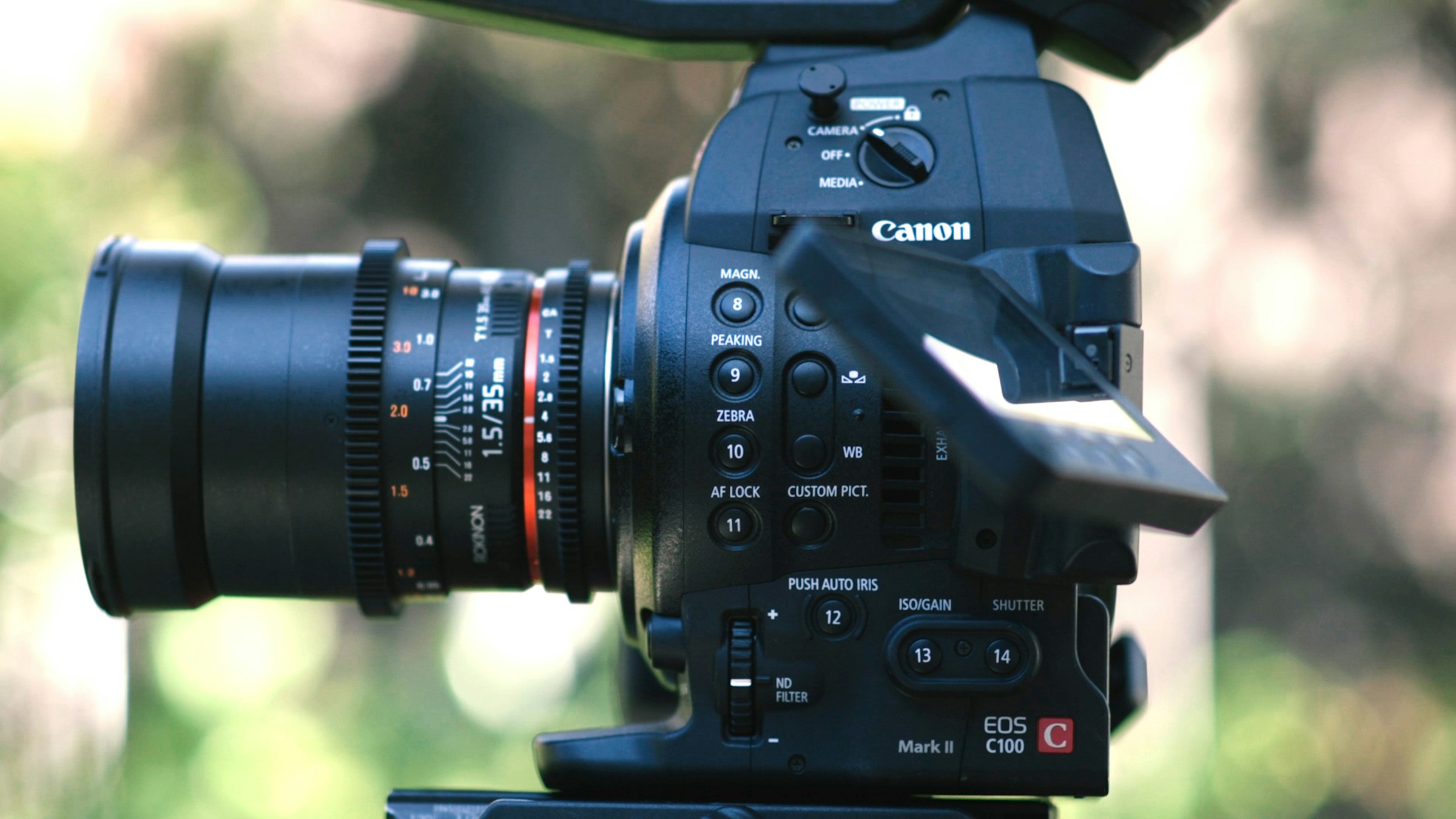 man taking a photo - Best Lens for Product Photography