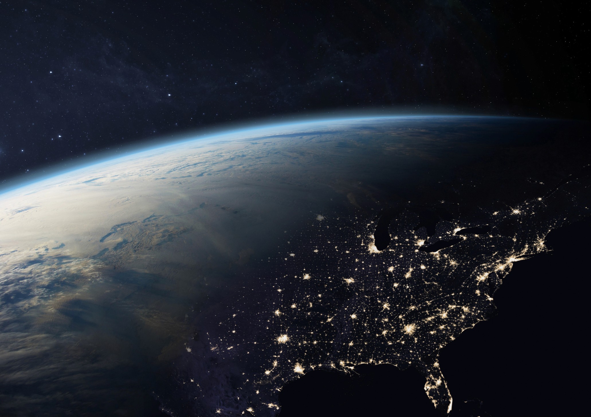 Earth at night from space centered on the East Coast and Florida with city lights