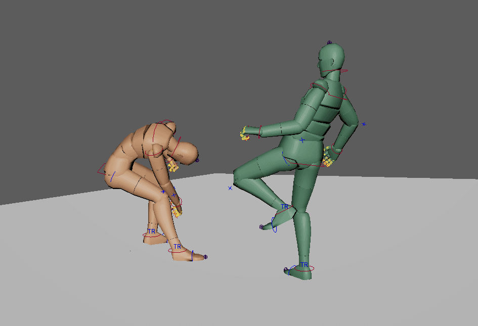 Two human models, one is keeled over