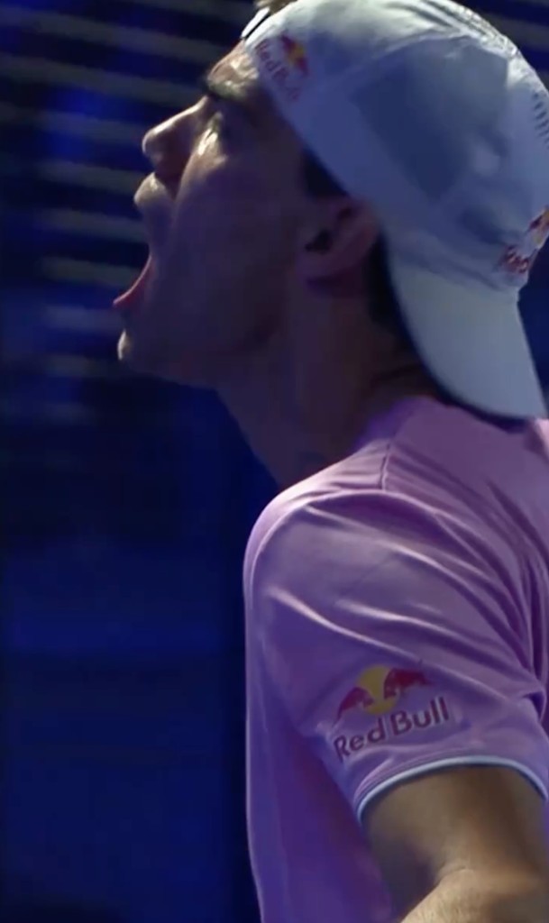 Padel player celebrating a winning point