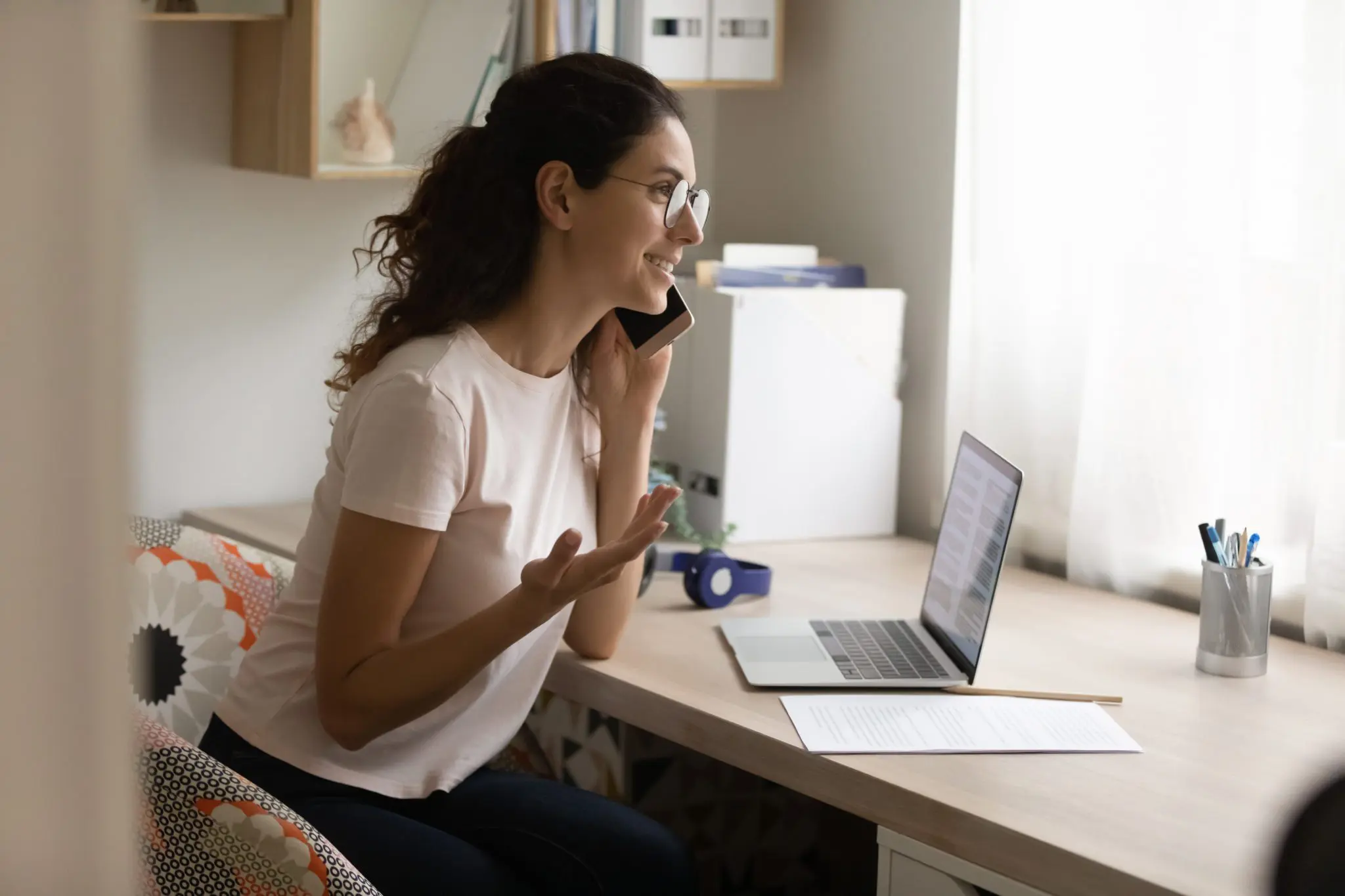 A student on the phone, making inquiries