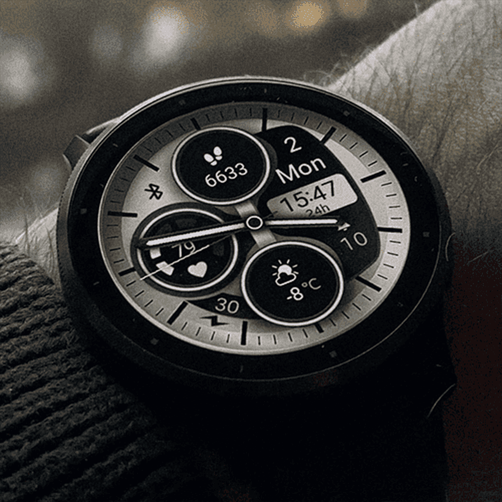 Garmin Venu watch displaying an analog watch face