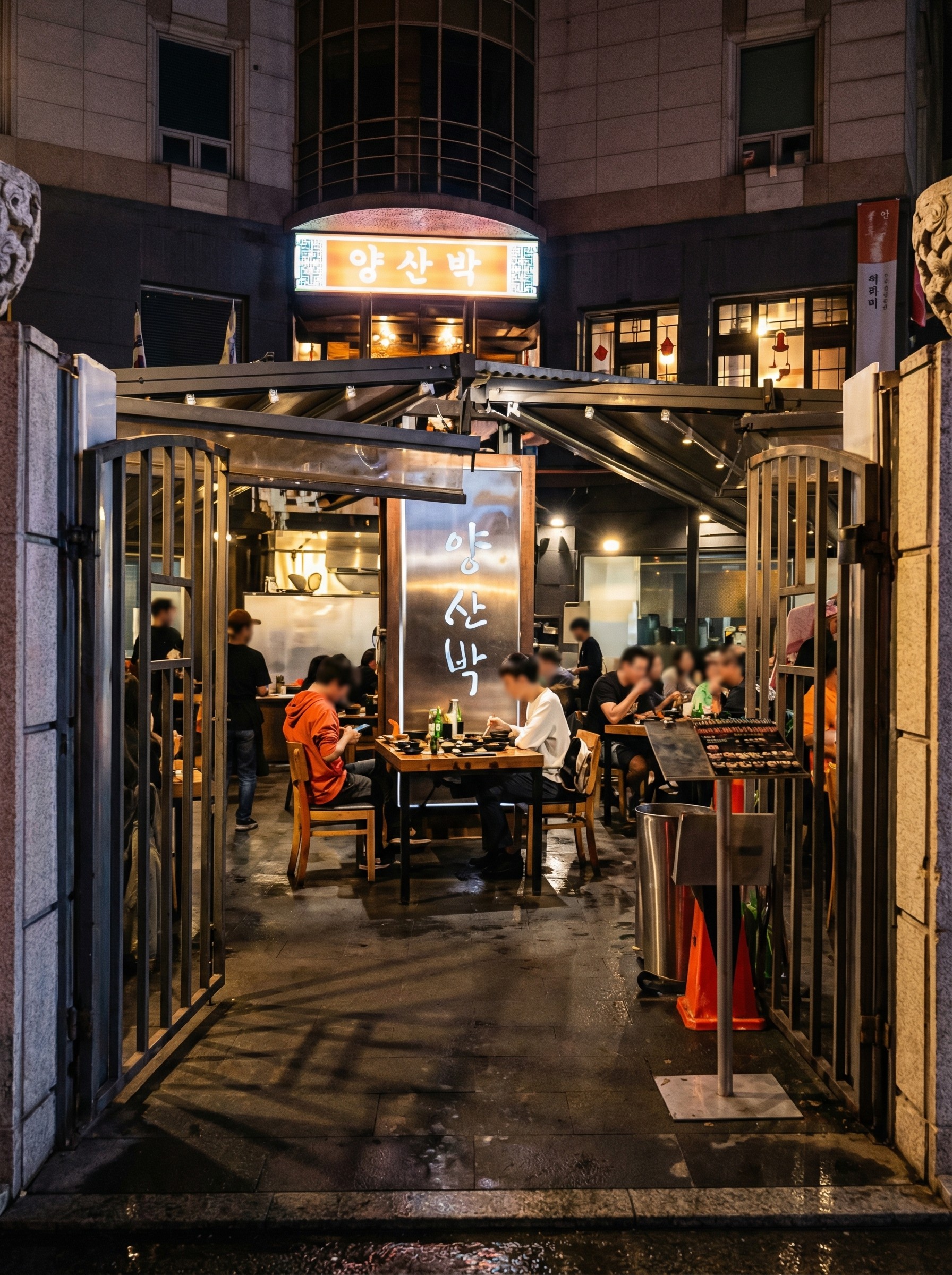 Entrance to Yang San Park in Sydney CBD with guests dining at Korean BBQ tables