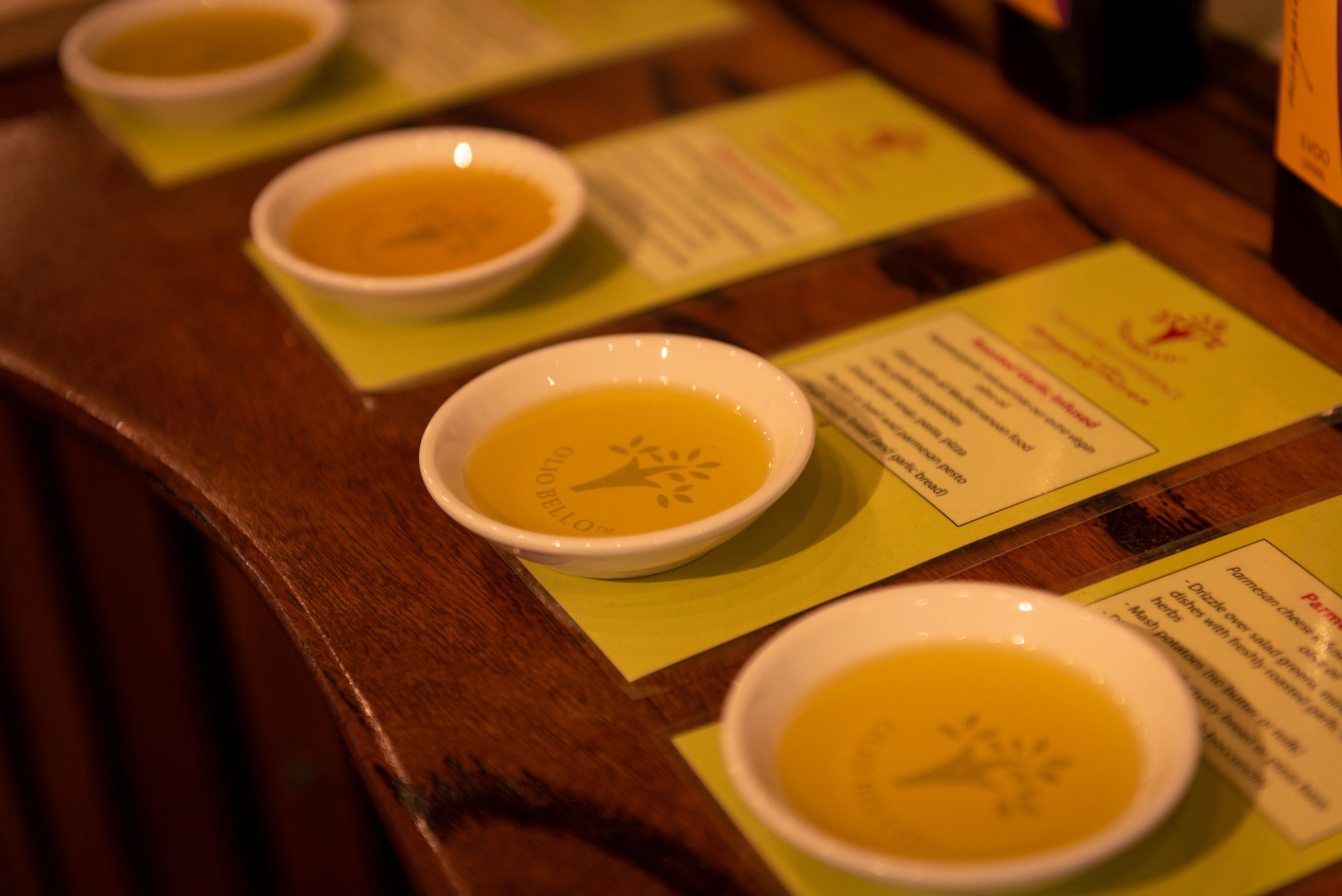 Macro shot of an orange peel being placed on a cocktail