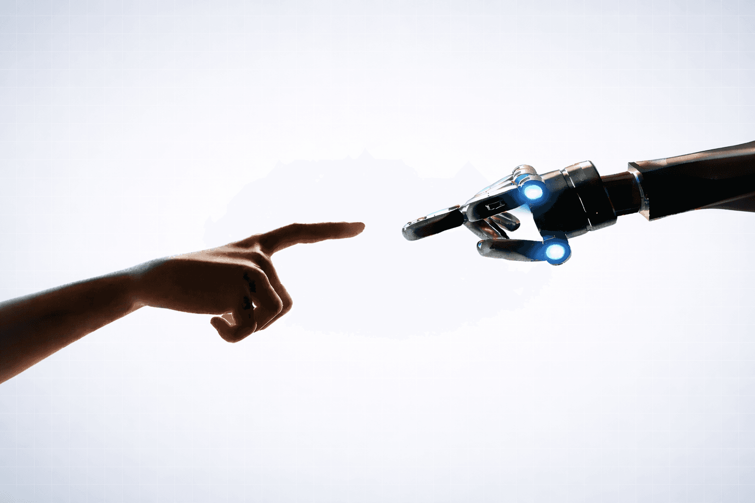 A robotic hand reaches out to touch a human hand, illustrating the interaction between artificial intelligence and people.