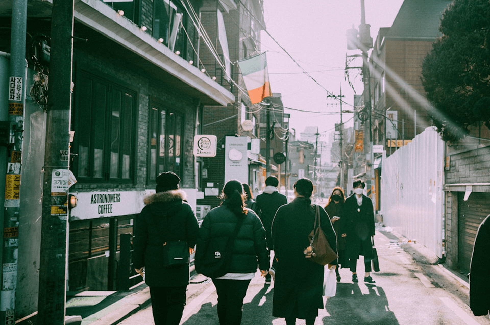 A crowd of people on a city street, symbolizing contact database cleaning and target account identification with B2B data enrichment tools.