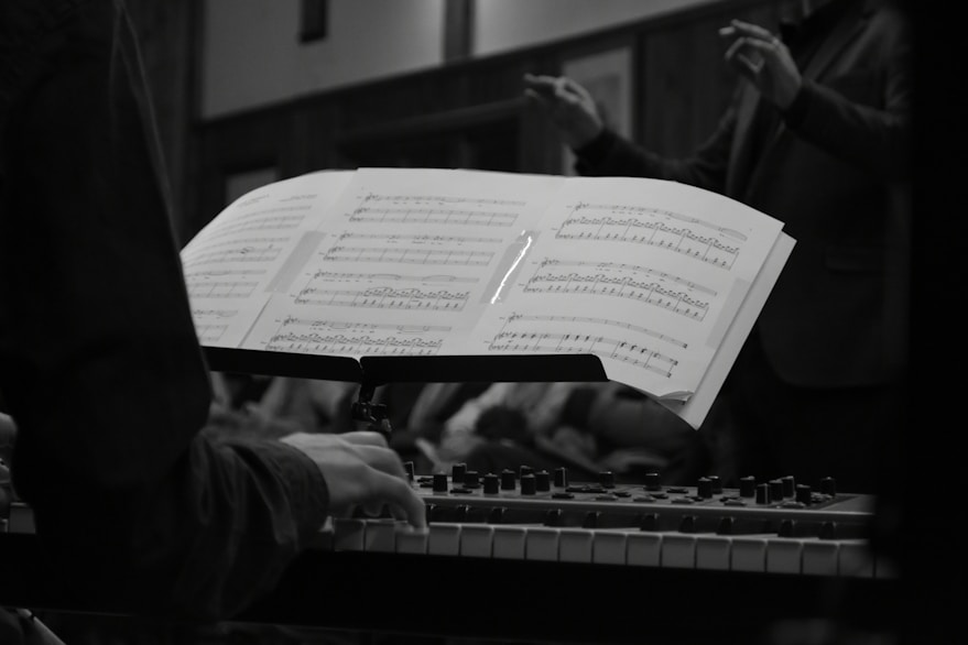 Piano keys with sheet music in studio