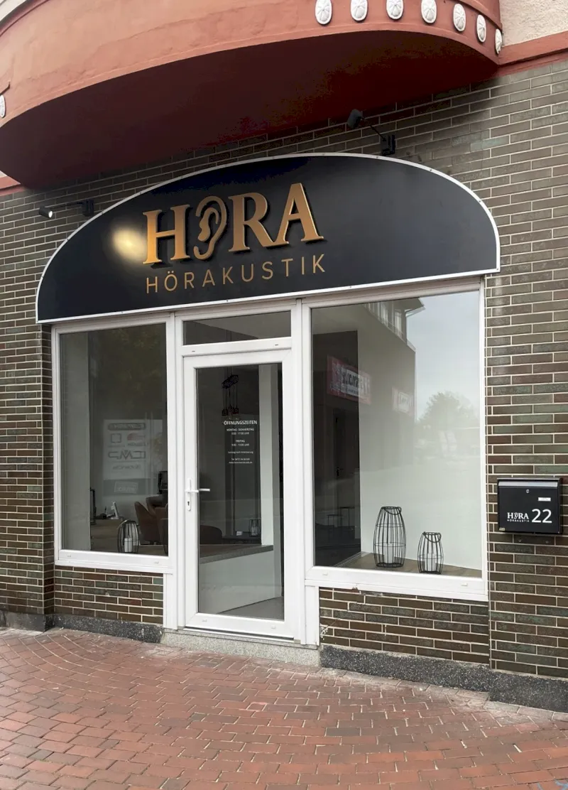 black flat screen tv on brown wooden table