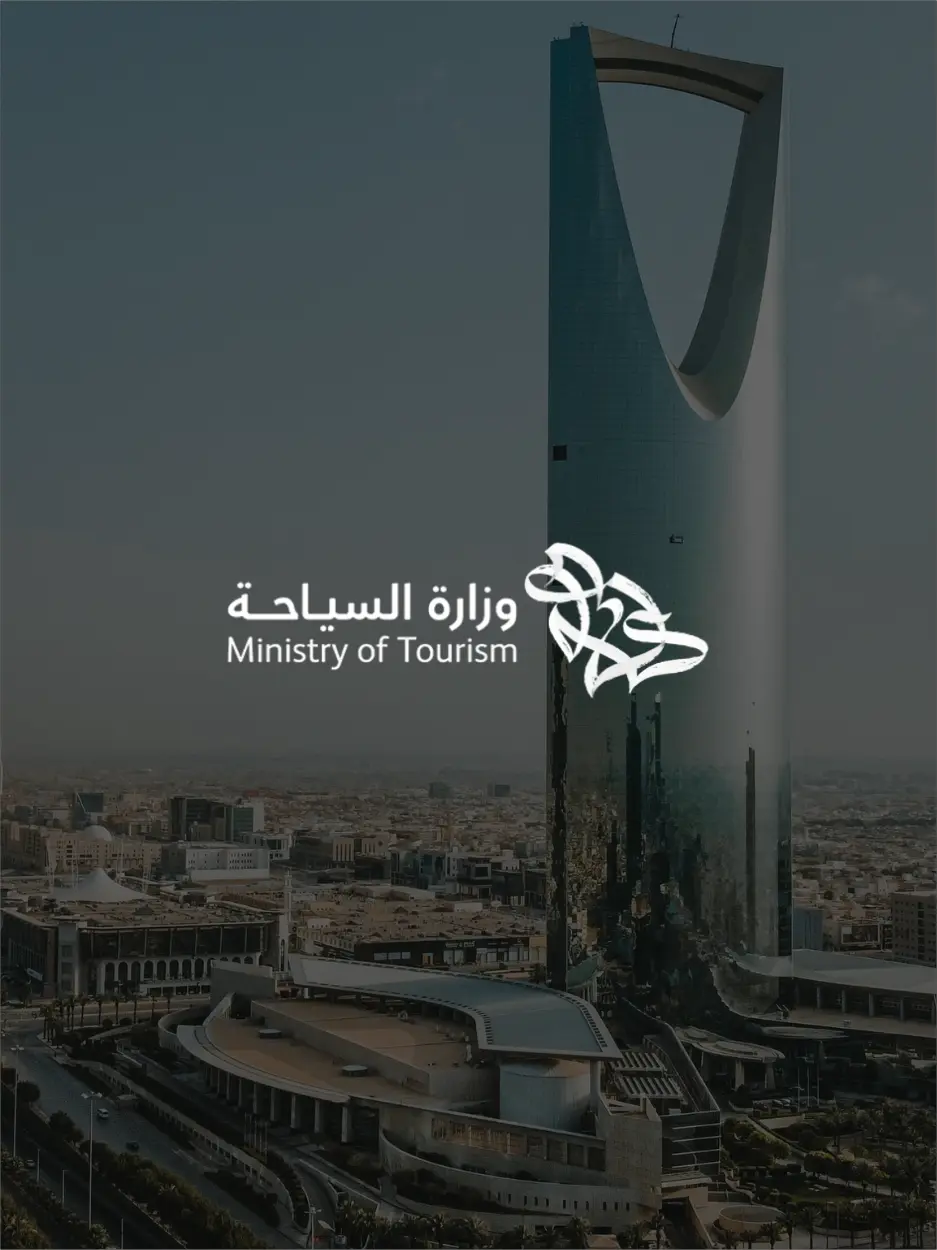Modern skyscraper rising above Riyadh city skyline at sunrise | Lunasole Hospitality