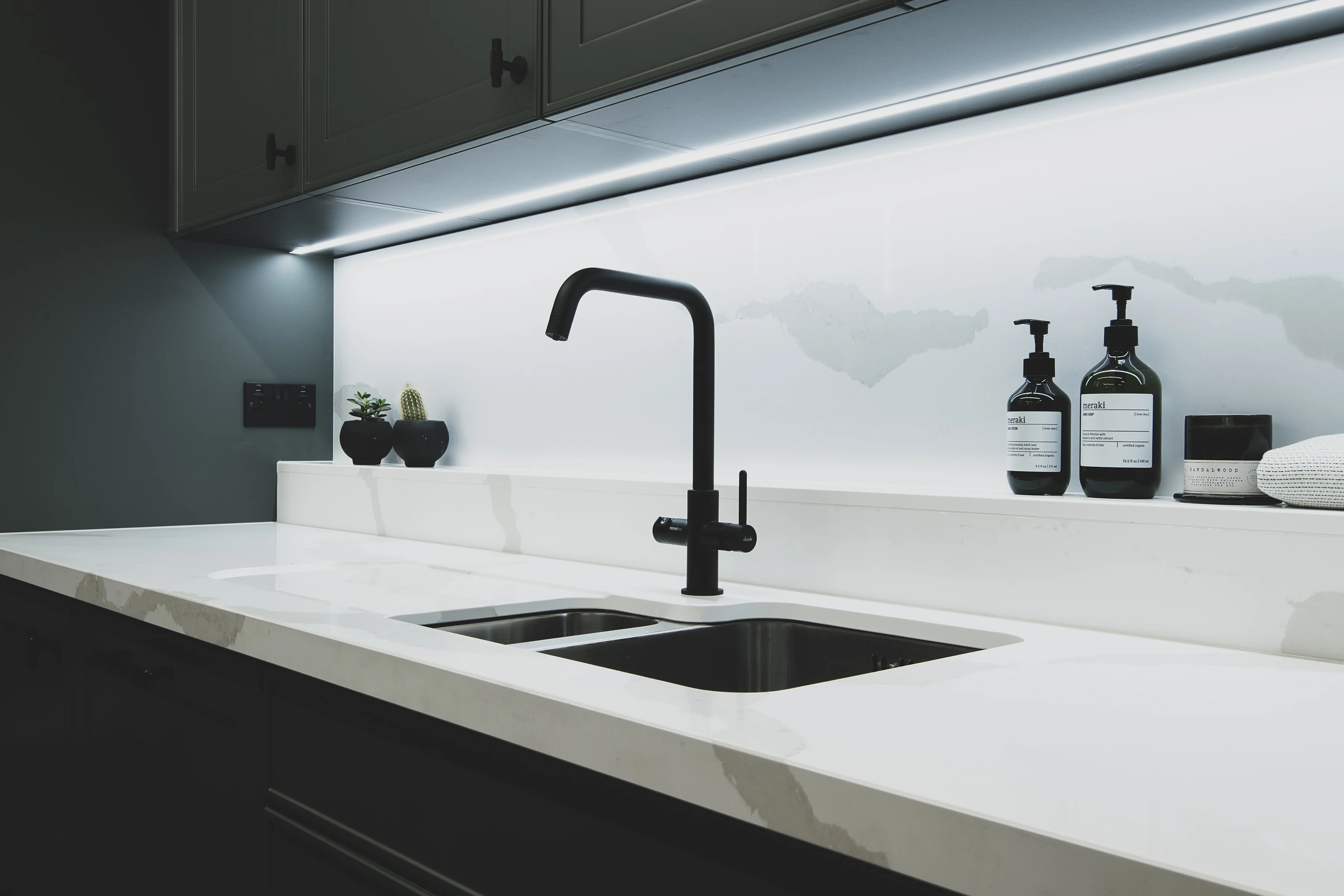 a black and white photo of circles on a wall