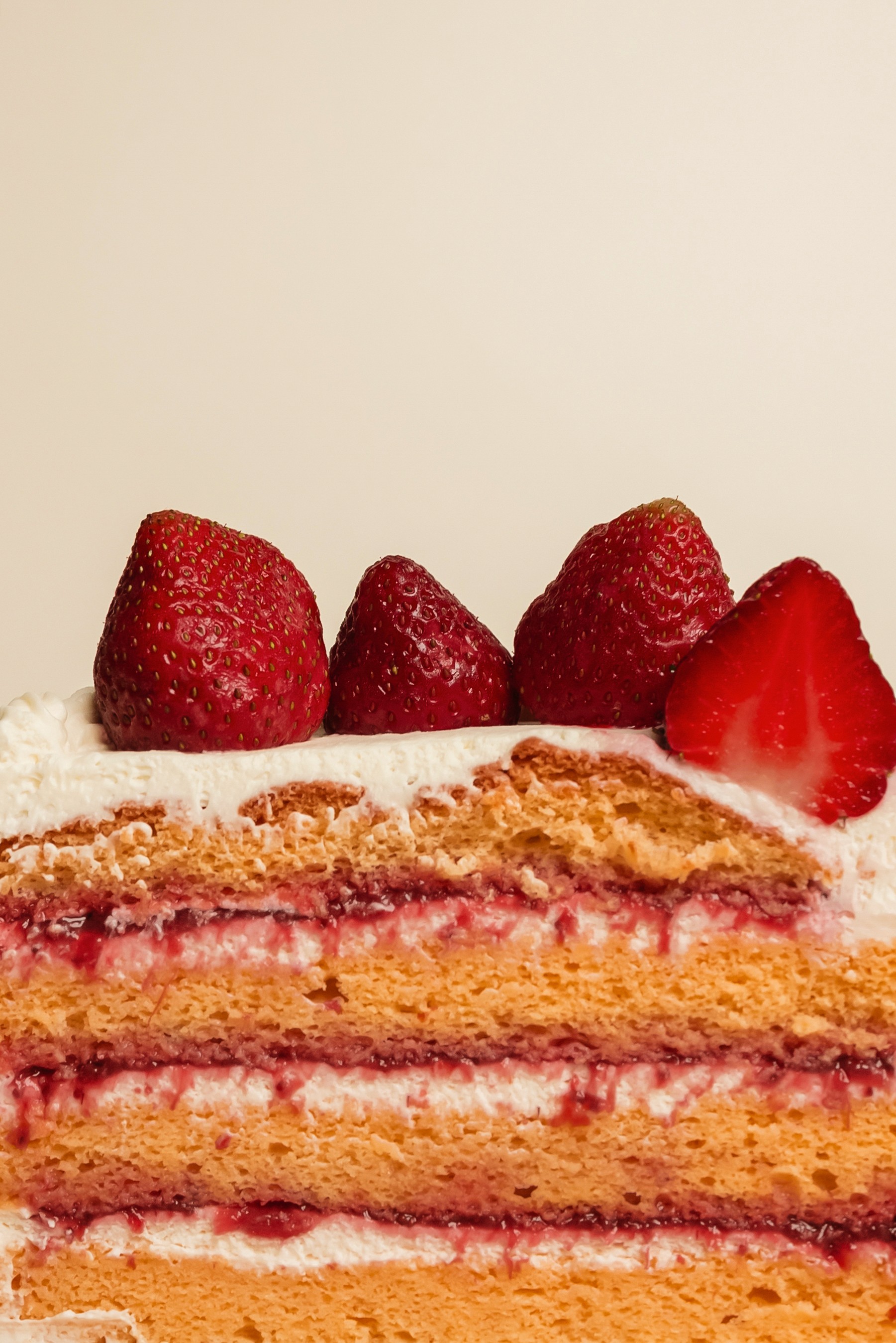 Spilled green smoothie with straw