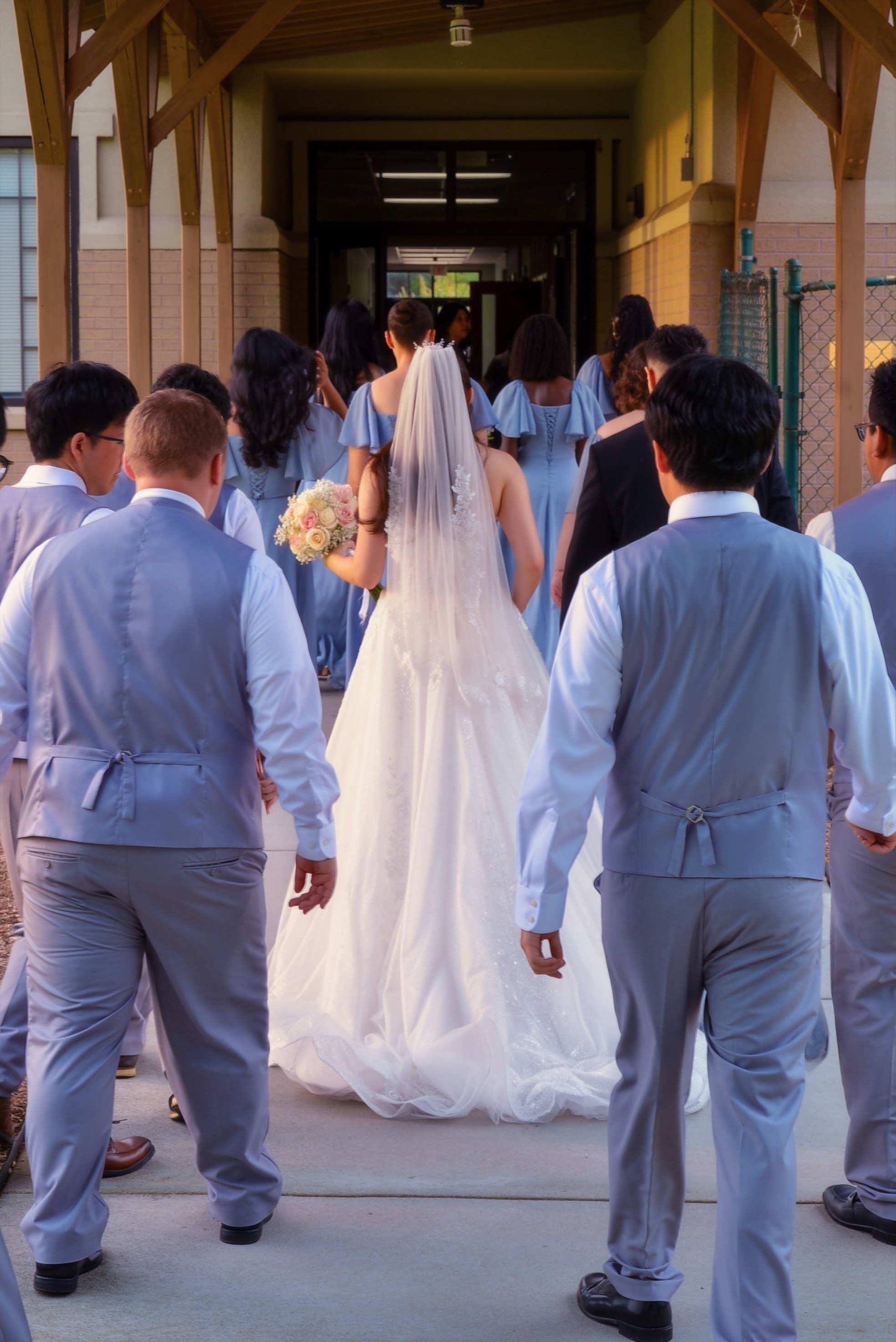 Bride in white gown and long veil walking with wedding party — Korean wedding at Korean Church of Atlanta, Duluth GA
