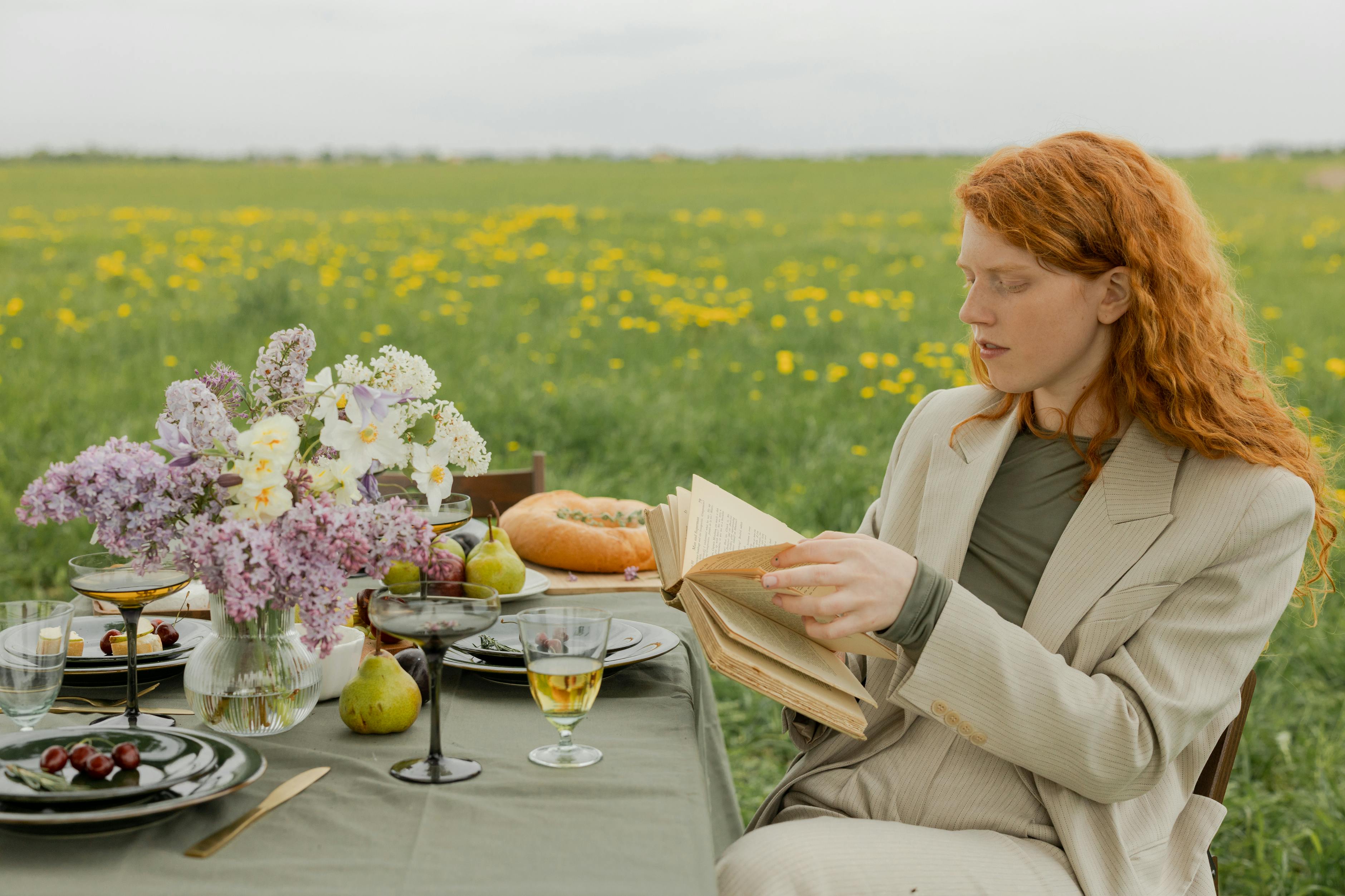 Women reading next to a table