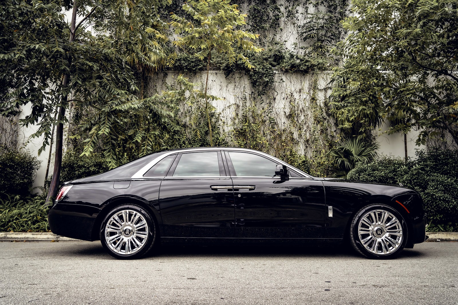 Perfect side profile highlighting the Ghost's elegant lines and black exterior from the right side.