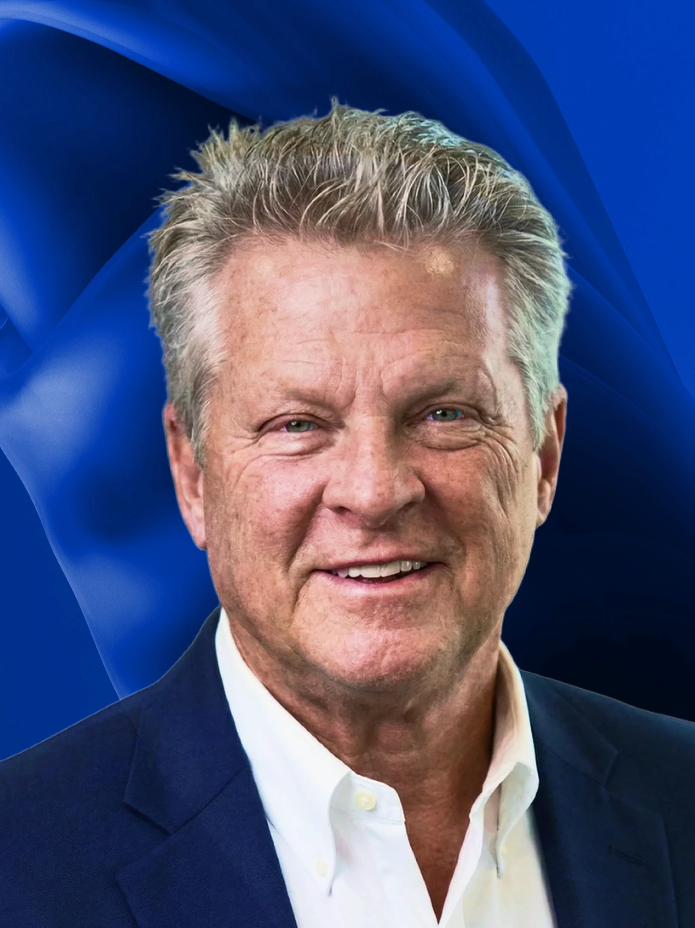 A woman with straight blonde hair wearing a light colored sweater looks away.