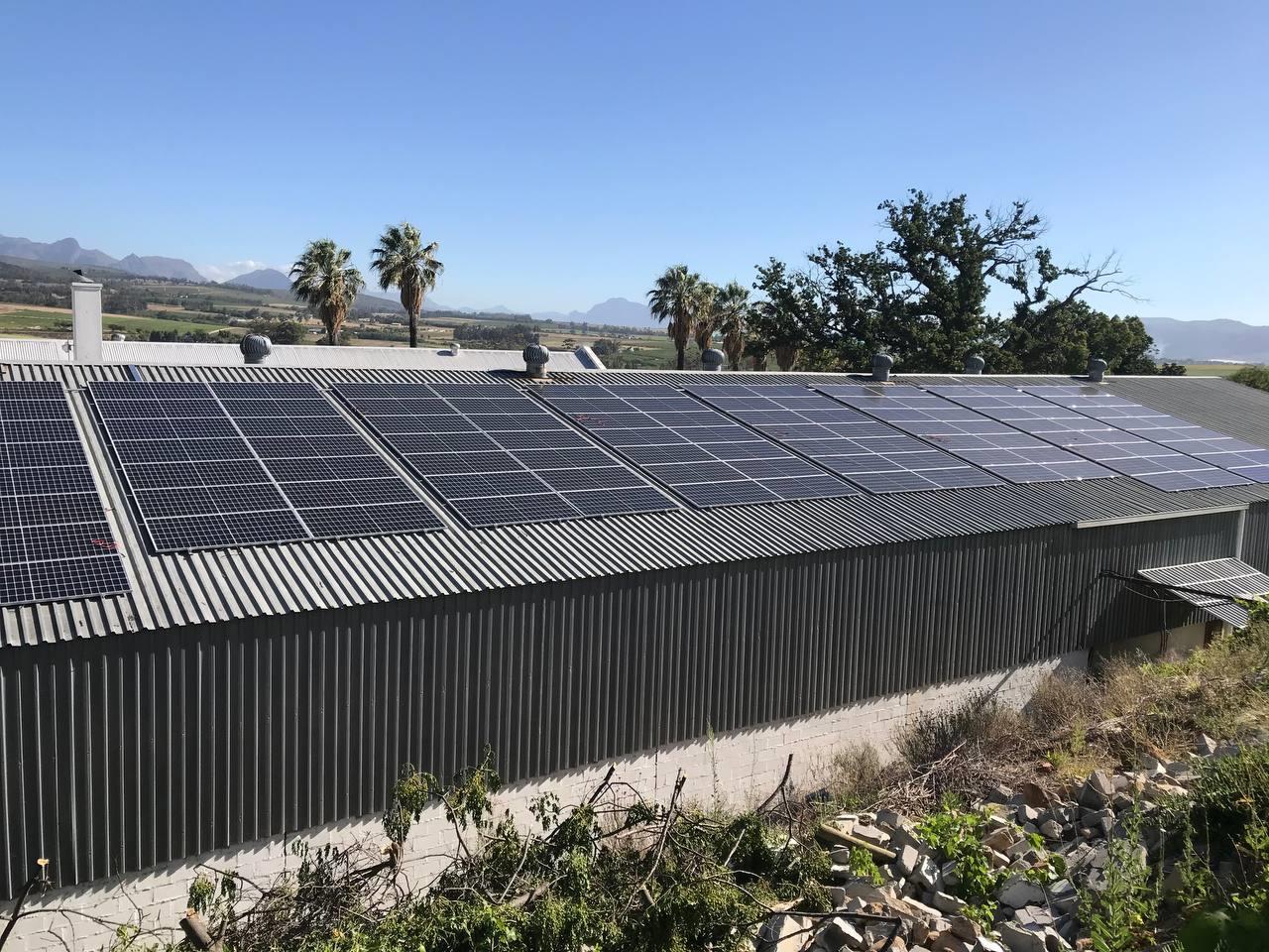 a man standing in a kitchen preparing food