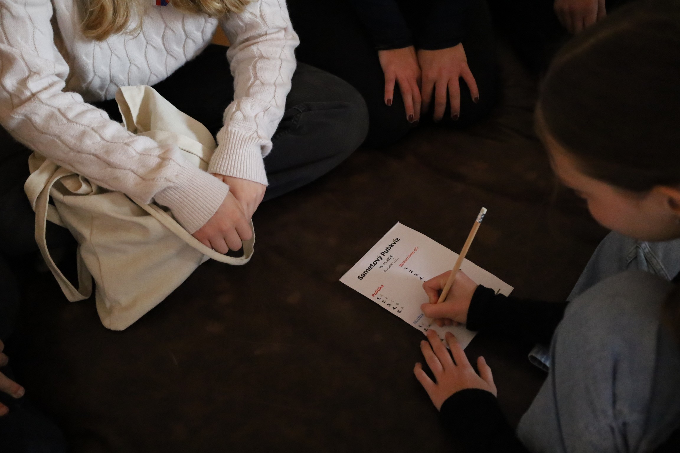 a woman holding a red flower