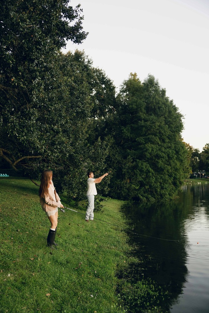     Wedding photographer South Florida captures a couple walking along the water during a destination wedding portrait session.
