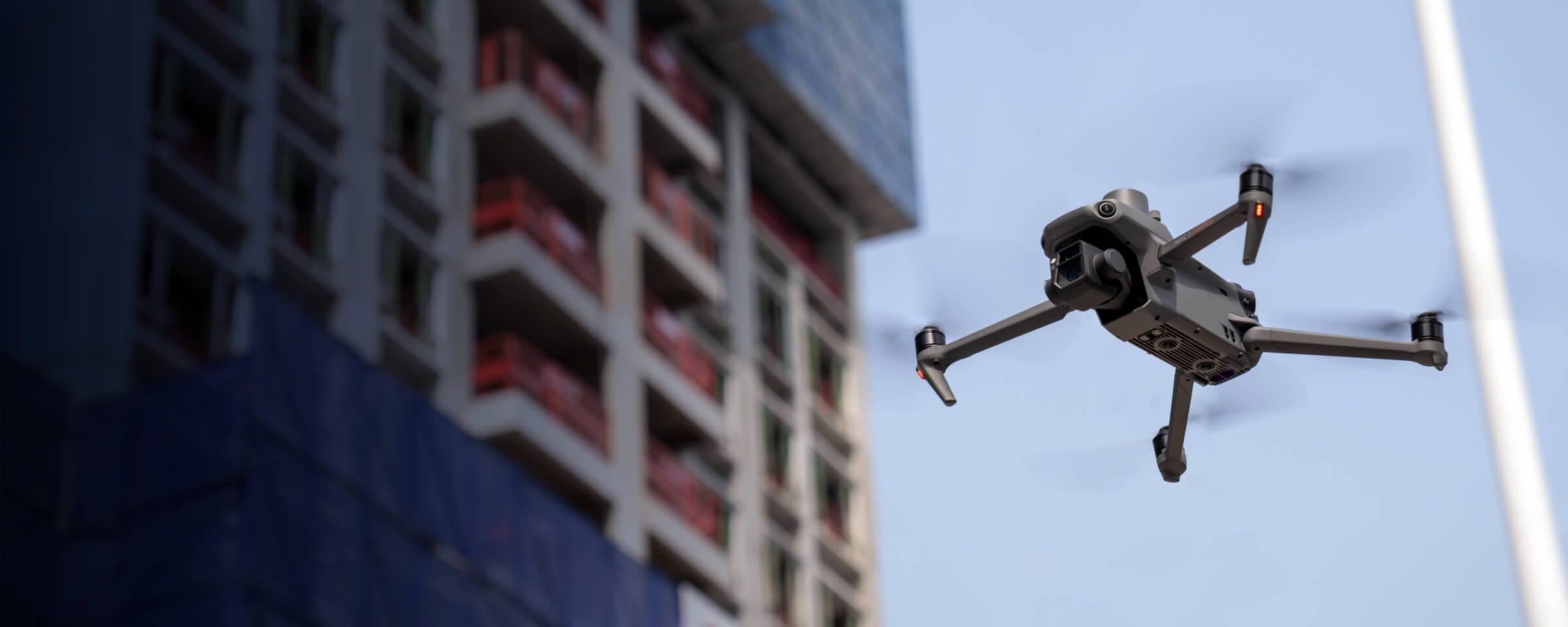A drone taking pictures at a construction site