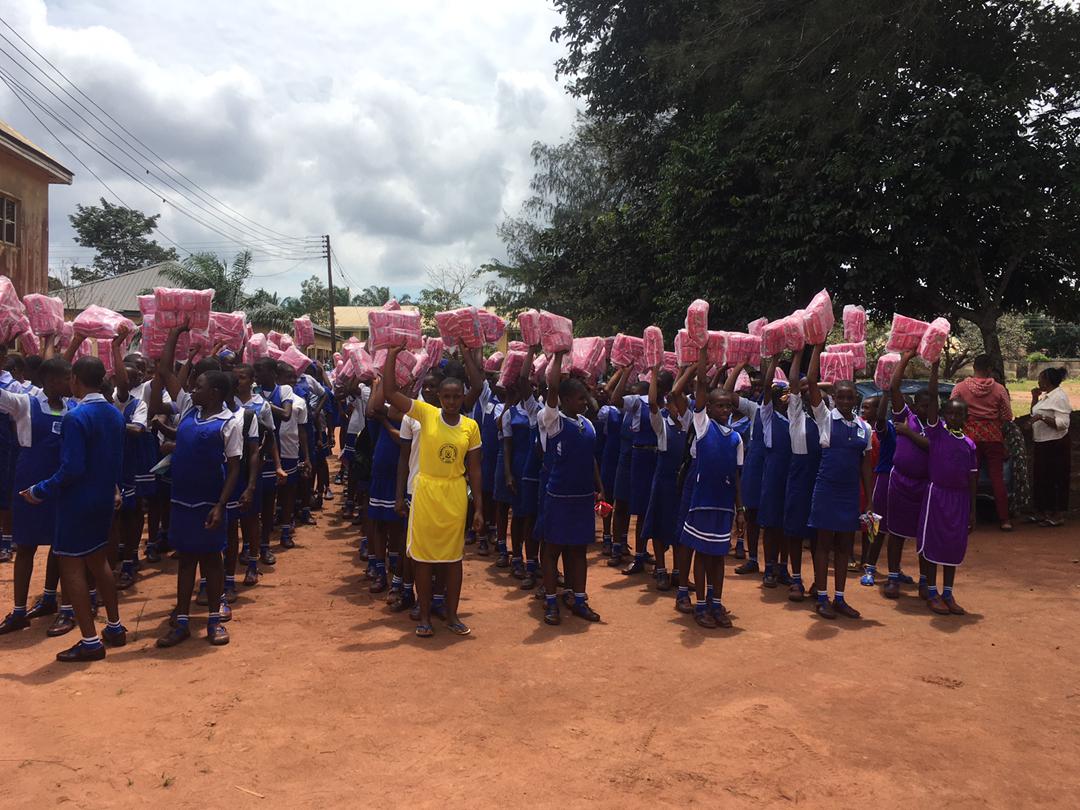 Female students carrying  sanitary pads