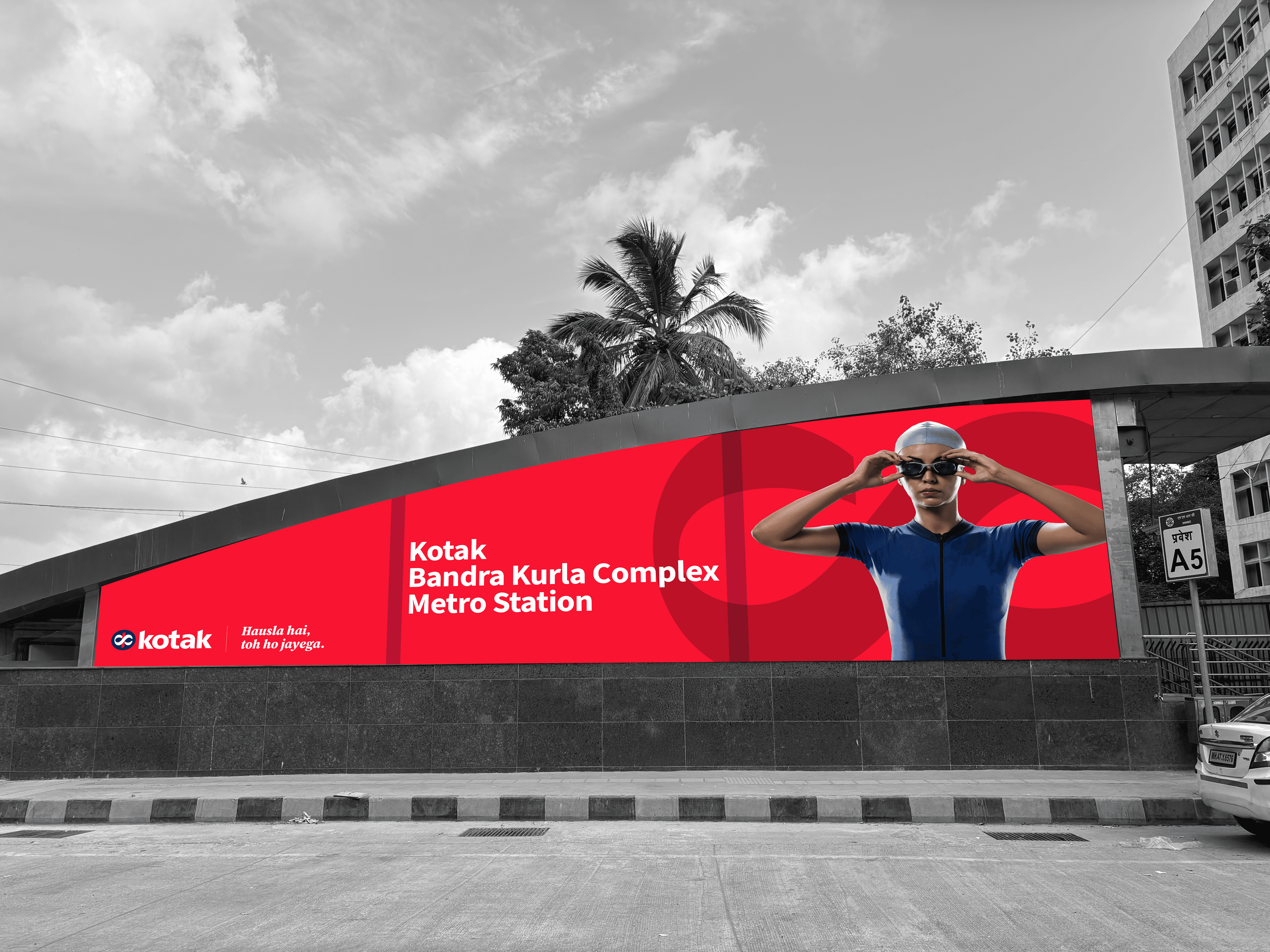 Hand holding waffle cone with three scoops of colorful pastel ice cream