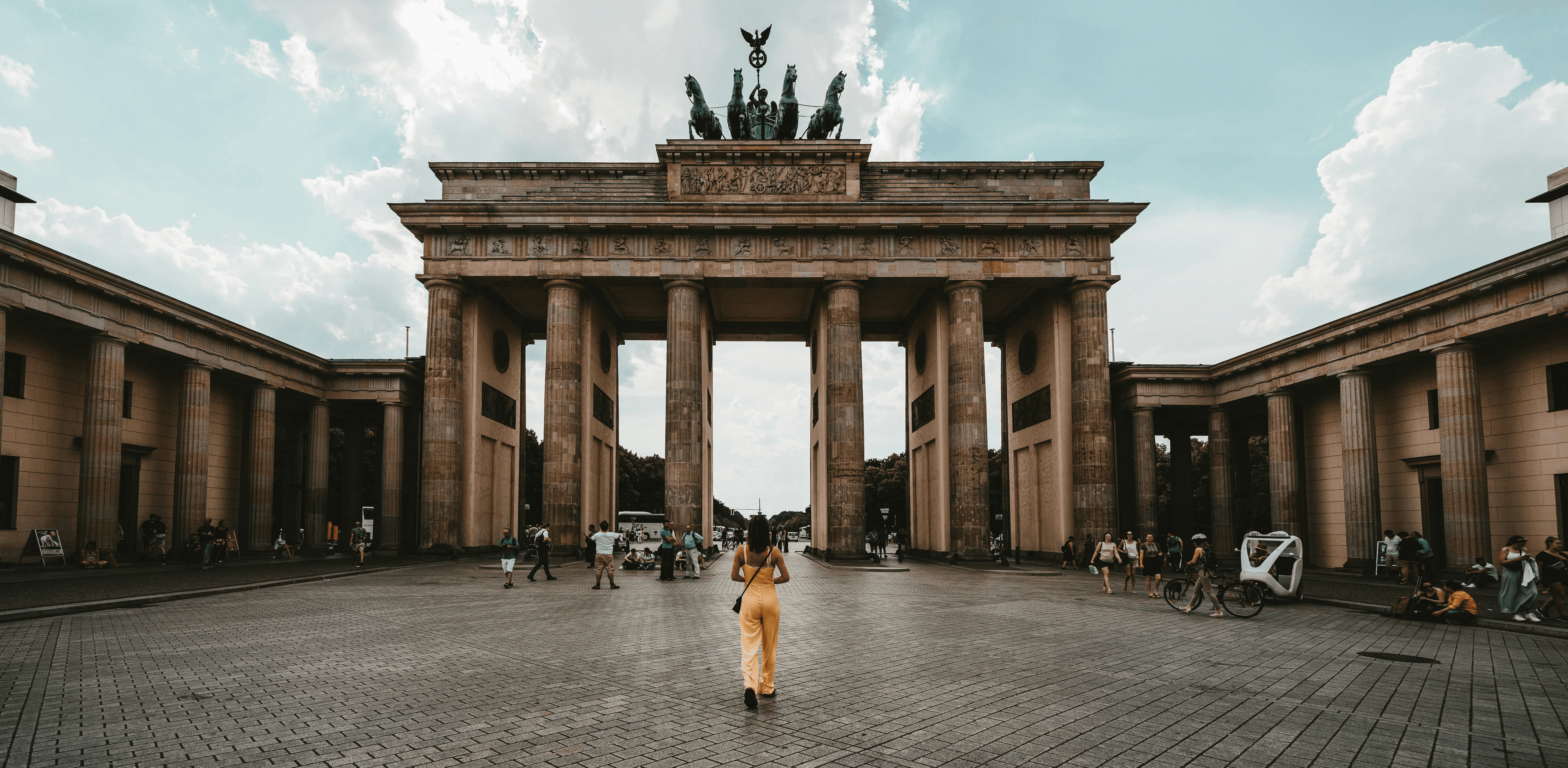 woman standing near building