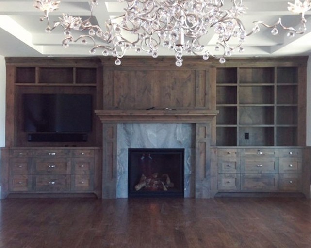 Image of Luxury living room interior design featuring KHD Homes' expert construction and layout design with fireplace.