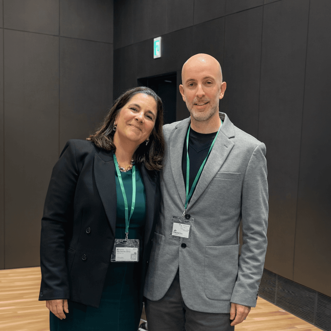Maria Fernanda and Federico in a conference.