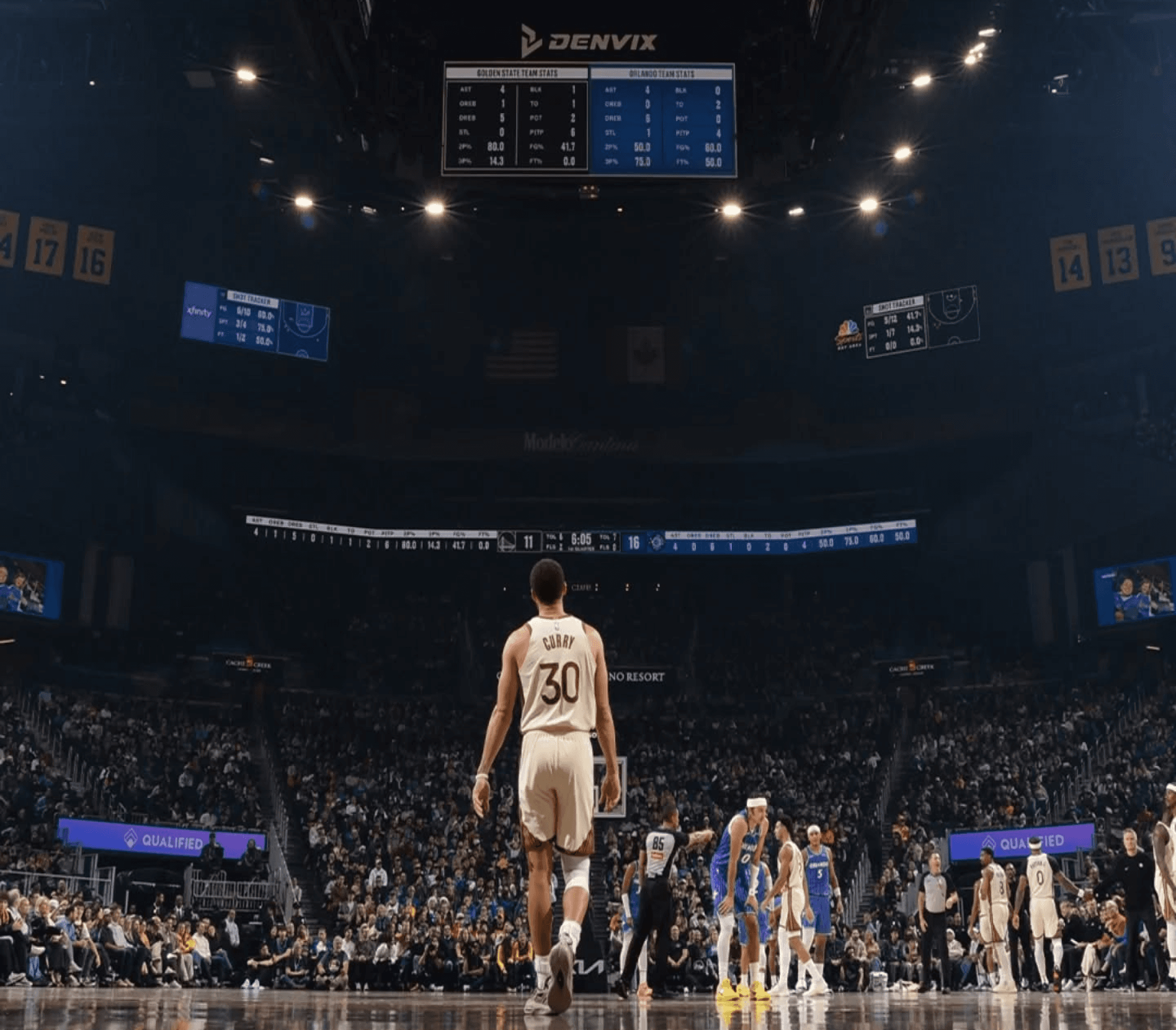 Stephen Curry standing alone on the court in a packed arena
