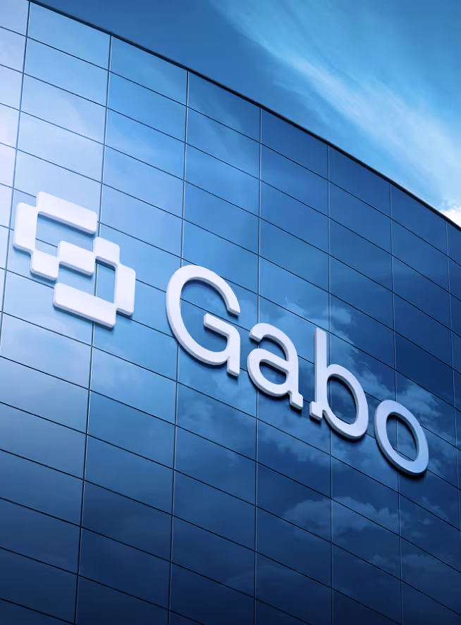 Modern blue-glass building facade with the word