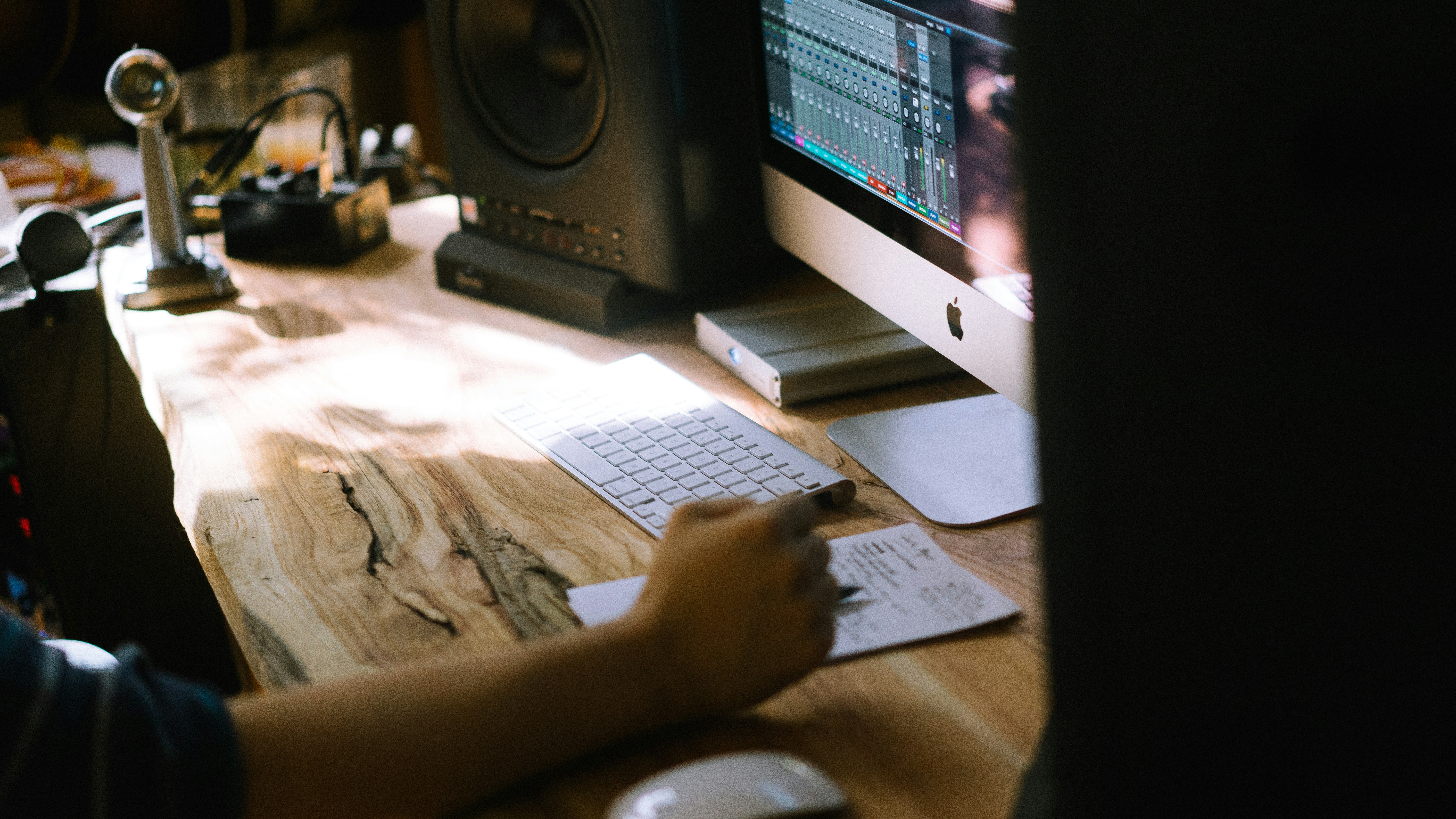 person creating new songs - Desk for Music Production
