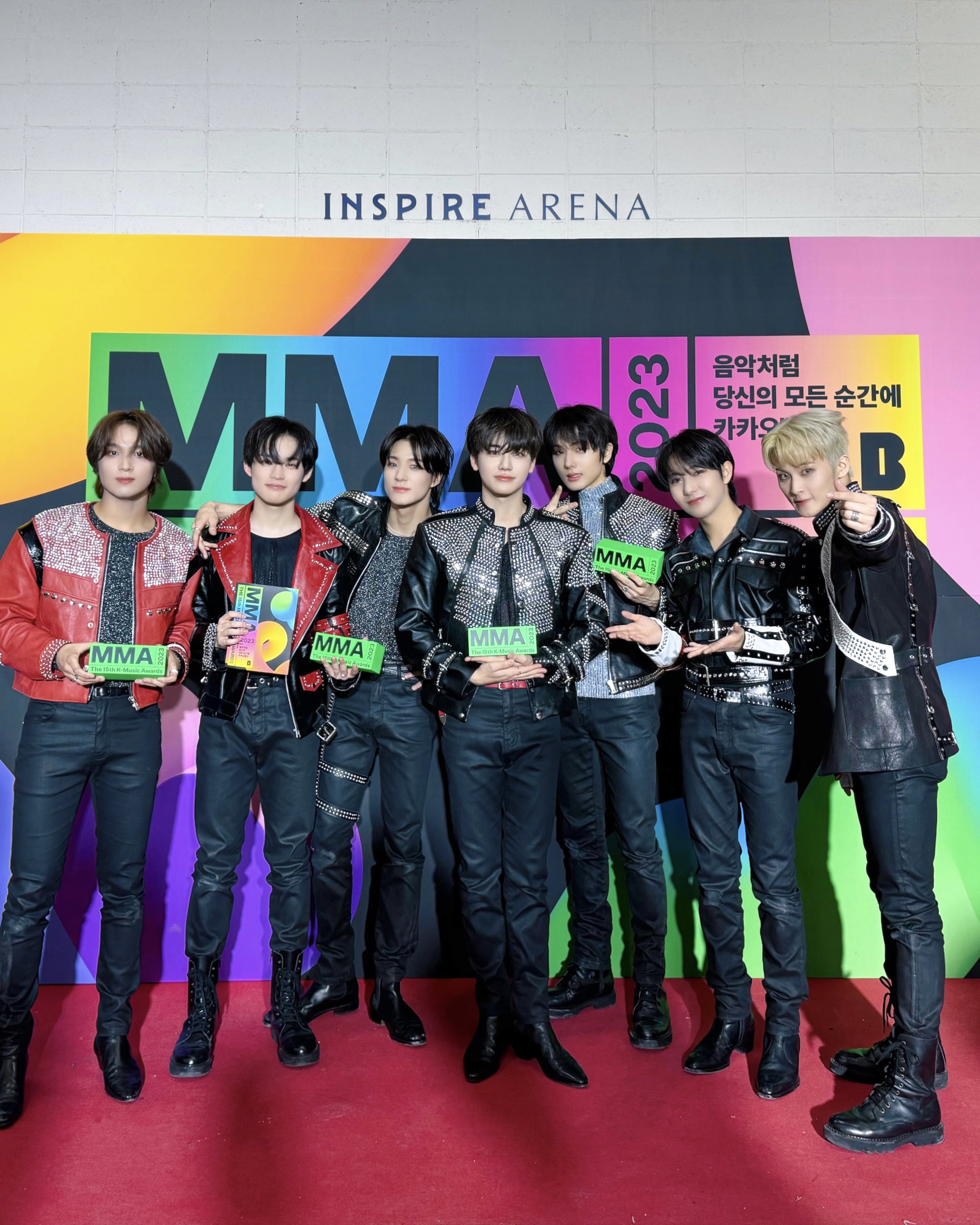 Streetside billboard with flyposters of the Batch.Works brand and illustrations