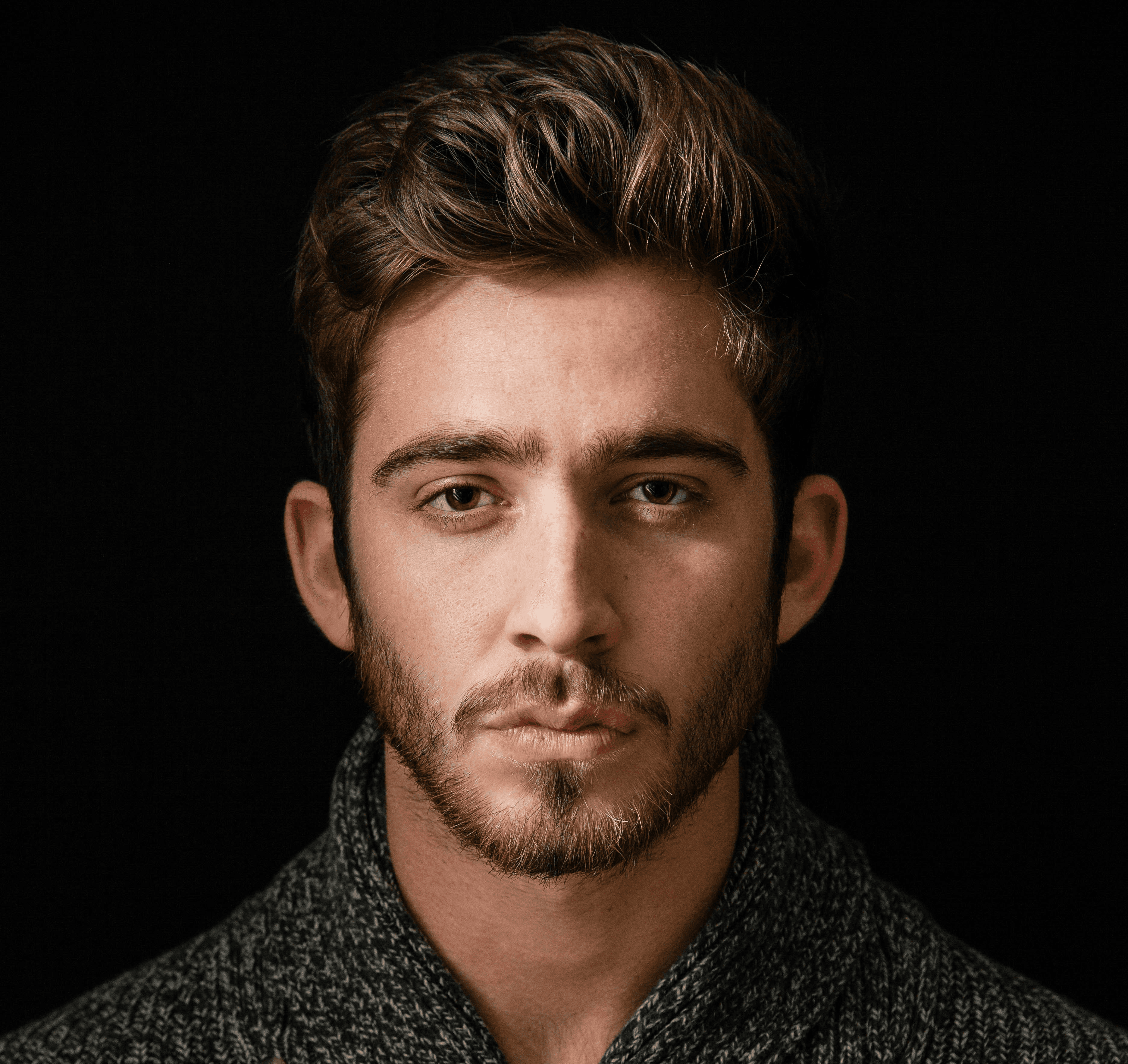 Sara is a client smiling to the camera happily